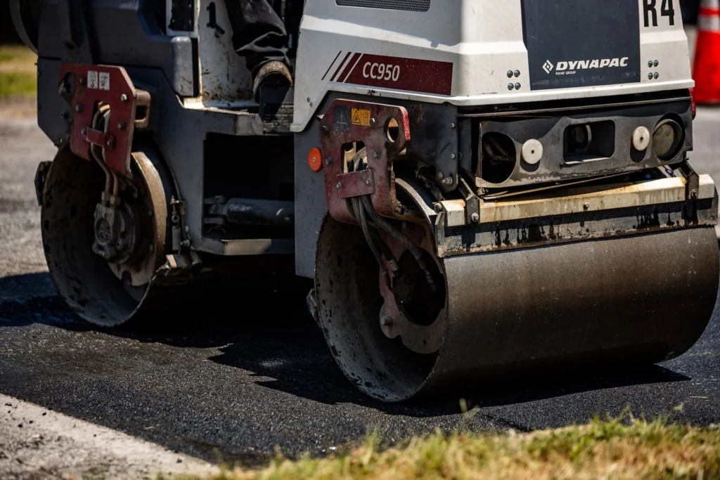 full depth reclamation equipment stabilizing road base during construction