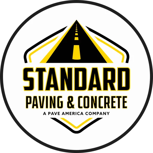 Standard Paving & Concrete company logo with roadway design