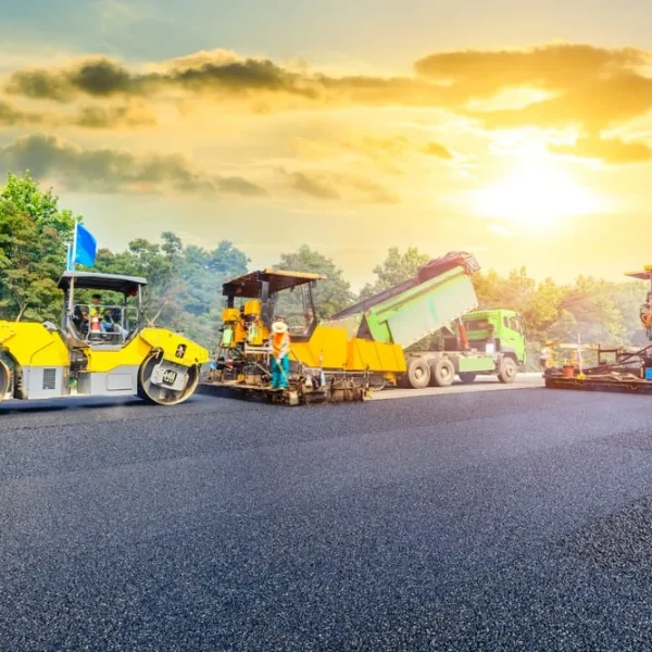 asphalt paving contractors working with beautiful sunset in the background in Annapolis, MD
